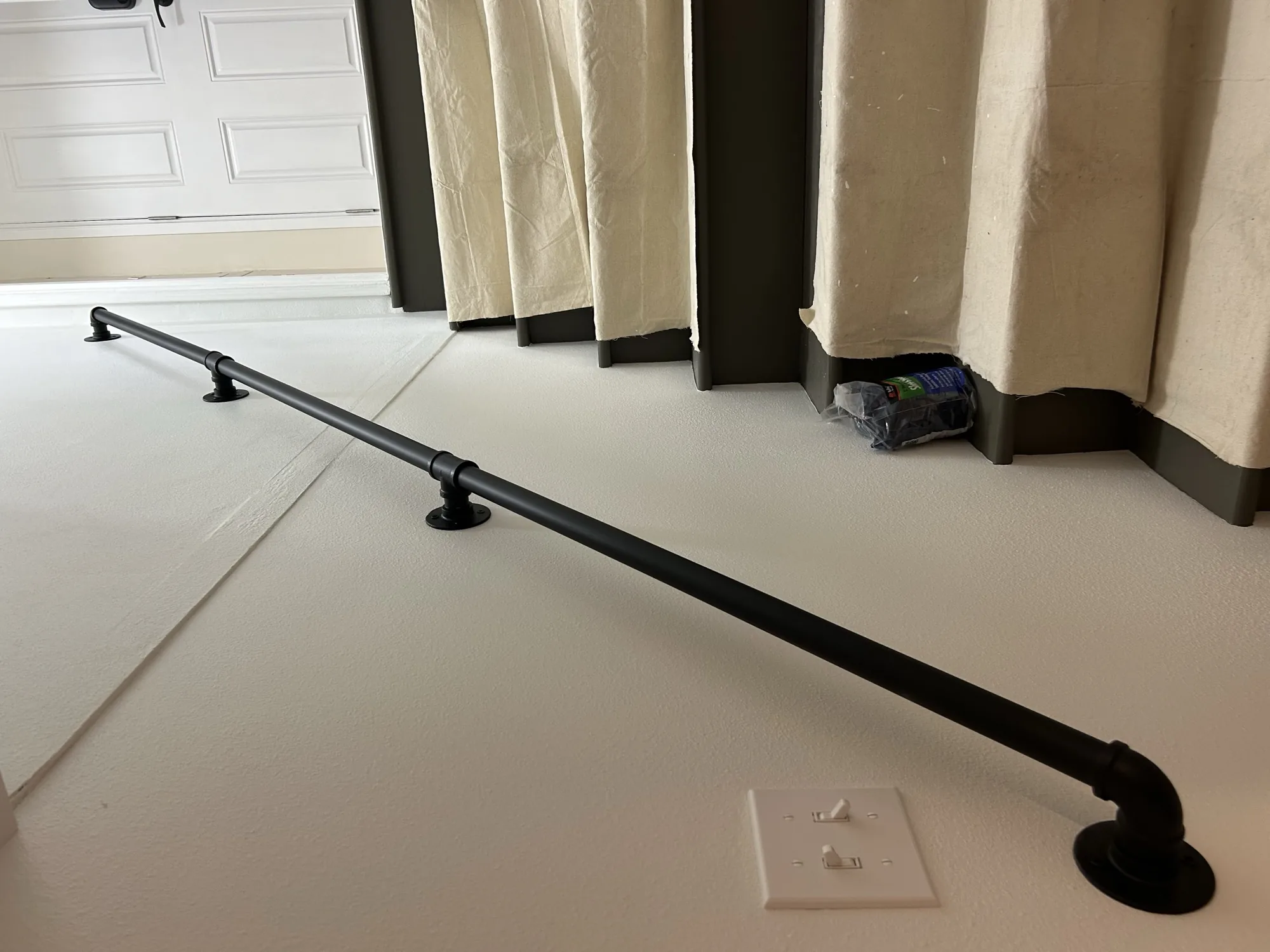 Custom pipe rail + interior iron work